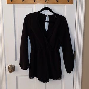 Black romper from Bebe
